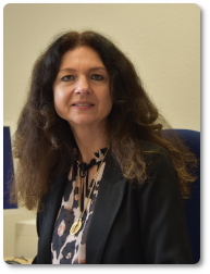 Frau Döllinger, Schulamtsdirektorin
